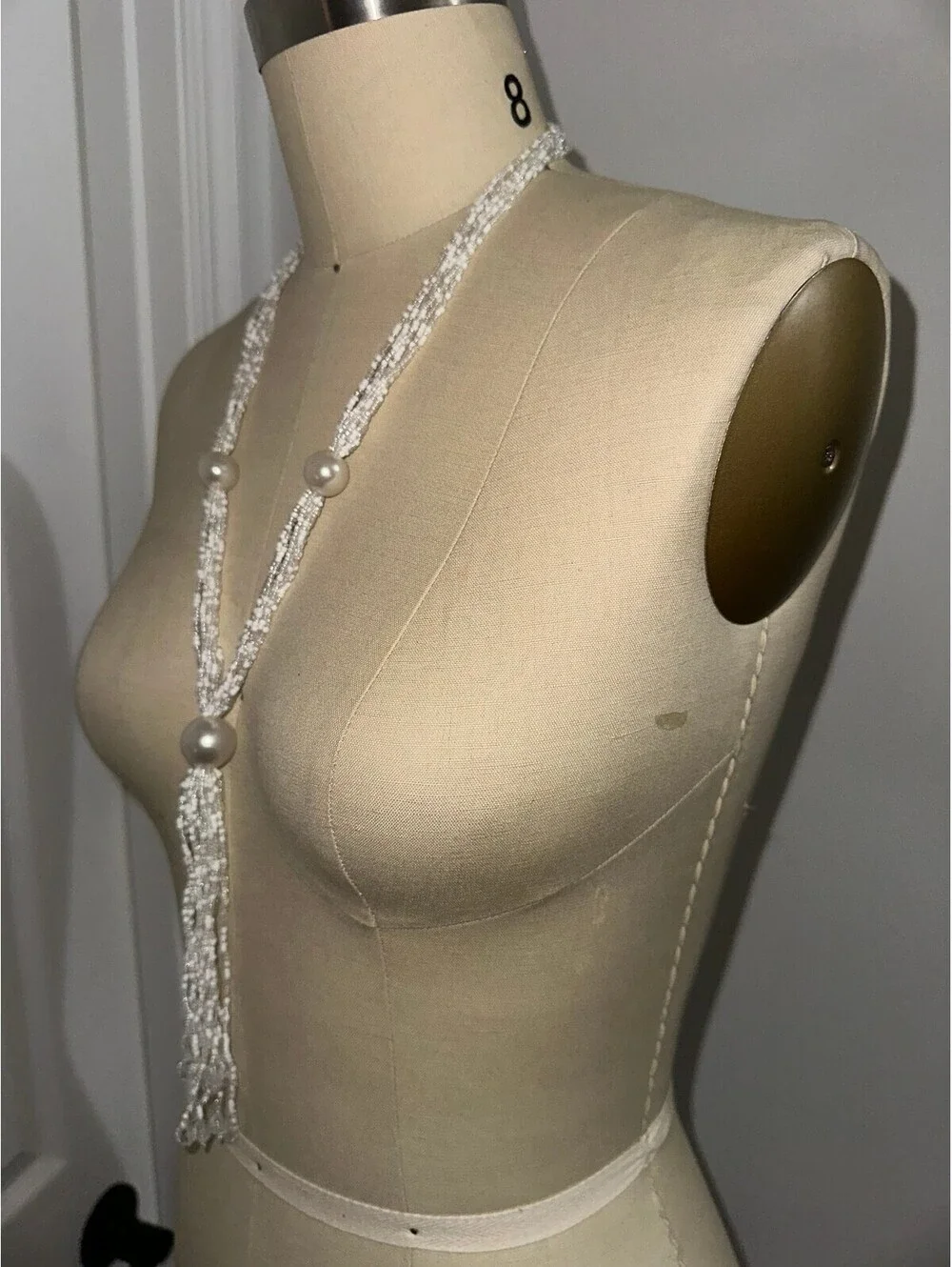 Elegant White Beaded Tassel Necklace with Pearl Accents